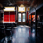 Elegant hallway with red curtains