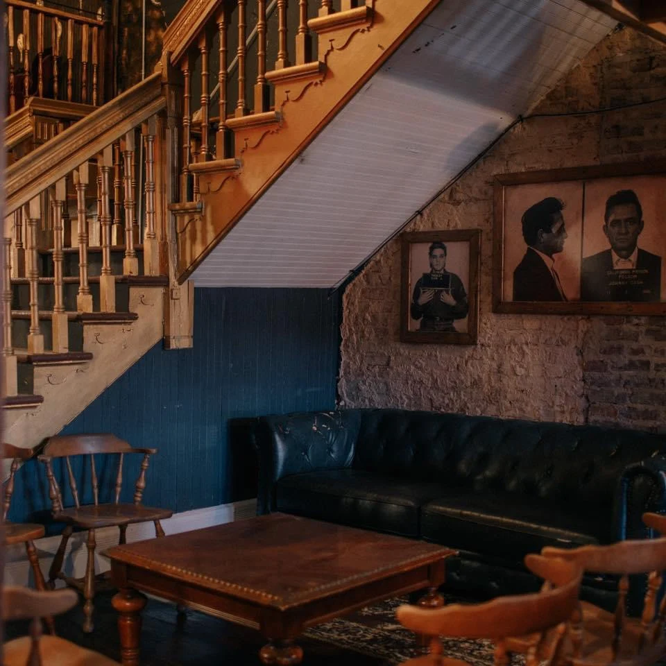 Vintage staircase and lounge seating